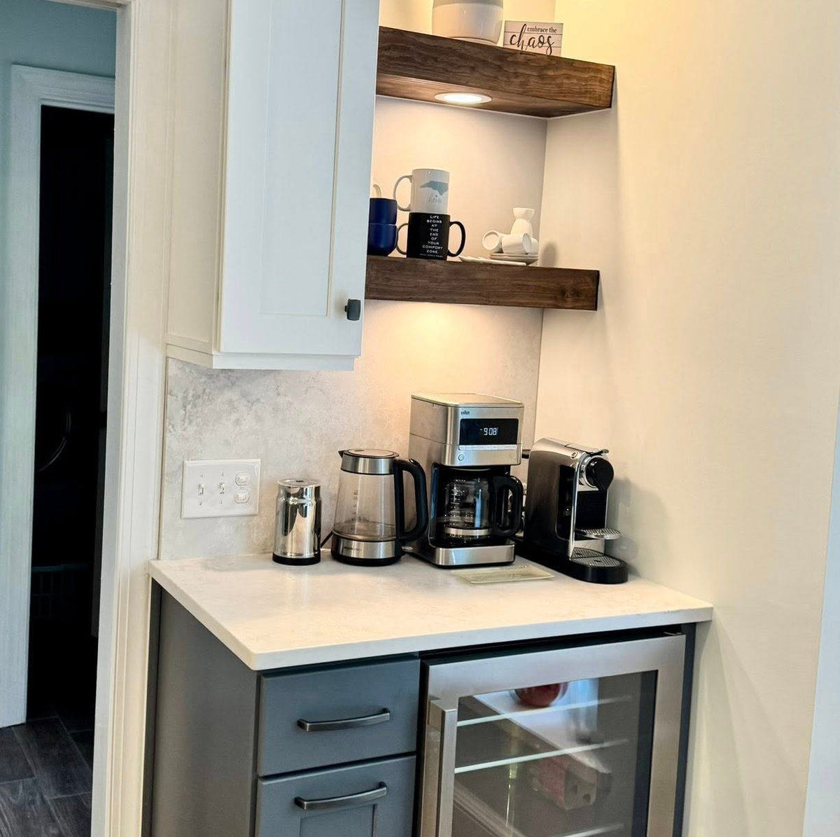 beverage bar in a renovated kitchen featuring tile backsplash, open shelving, wine fridge, and drawers beneath stone counters