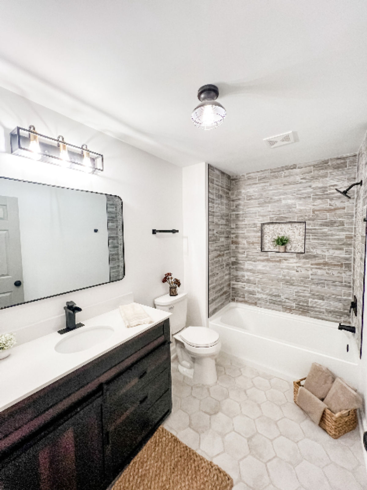 a renovated bathroom with light, airy, spa-like vibes