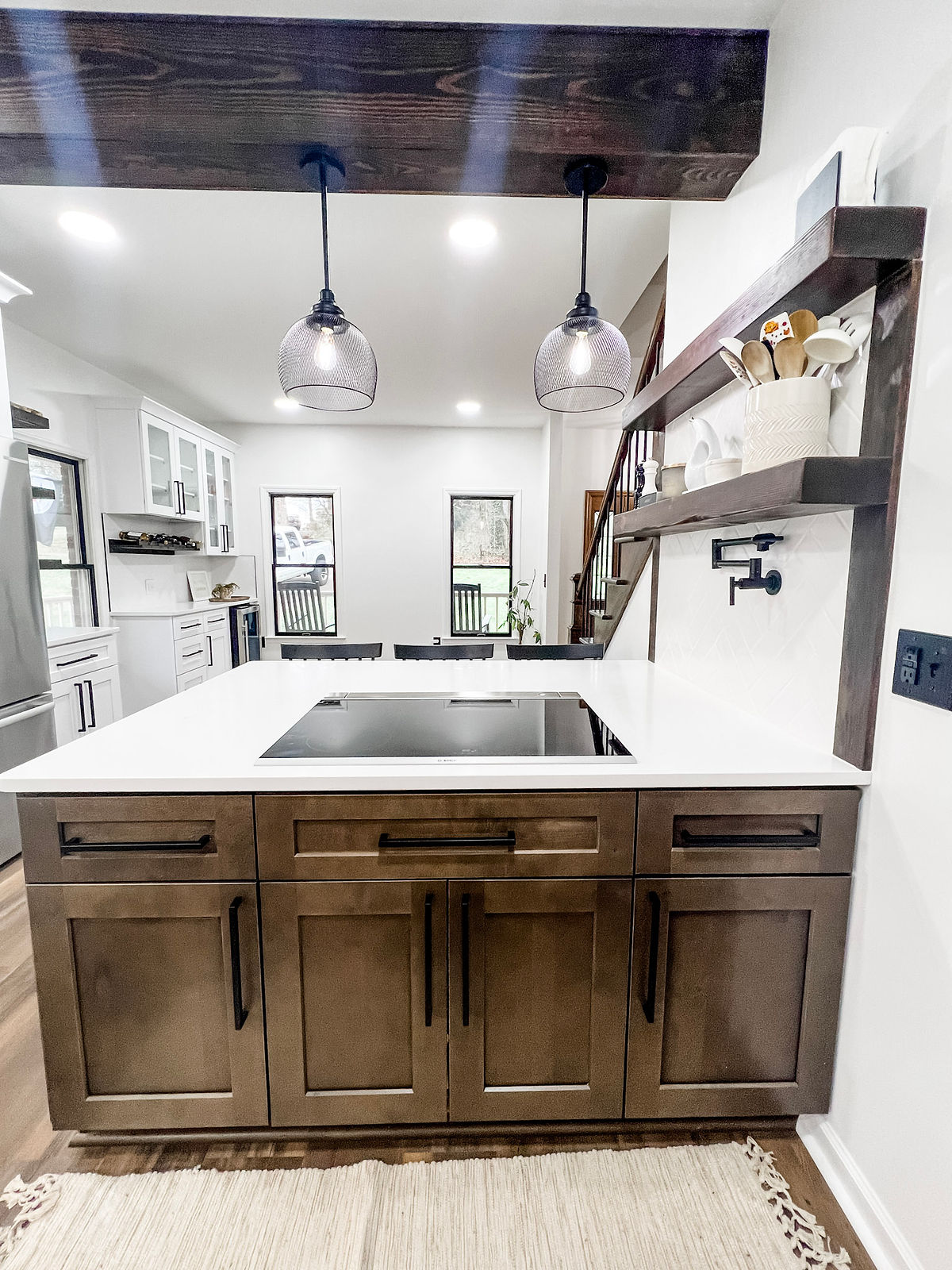 kitchen renovation near Davidson, NC featuring a very open layout with peninsula and counters running down along the left wall.