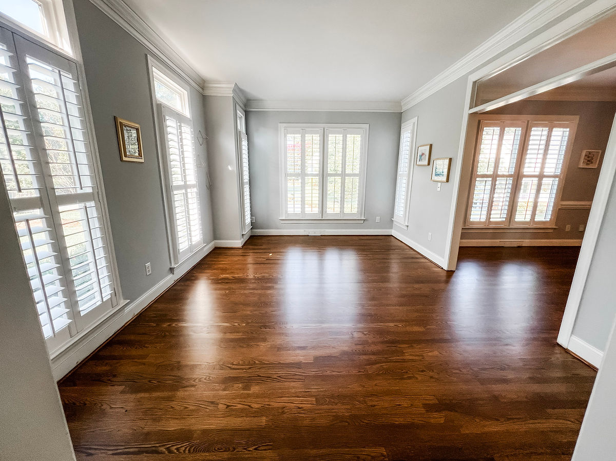 refinished hardwood flooring in a home renovation near Davidson, NC