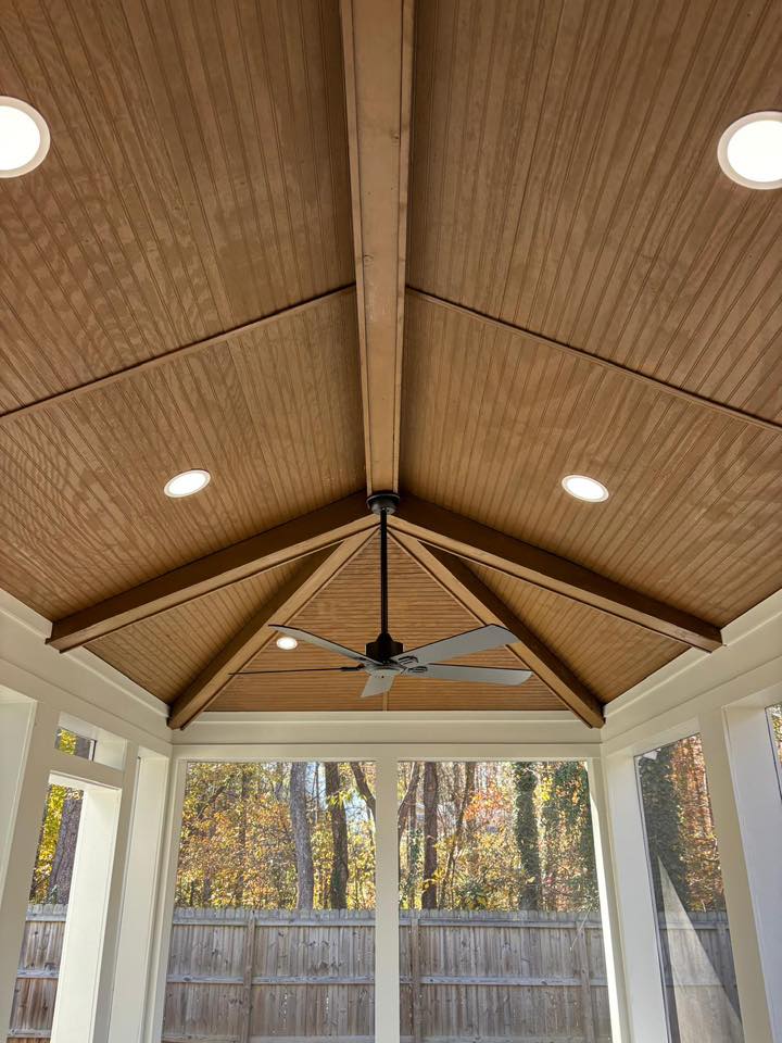 home renovation near Davidson, NC featuring tongue and groove wood ceiling on a screened in porch.